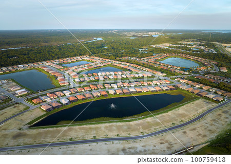 Ground prepared for building of new residential houses in Florida suburban development area. Concept of growing american suburbs 100759418