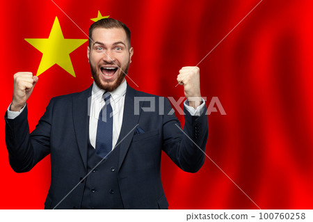 Chinese happy businessman on the background of flag of China Business 100760258