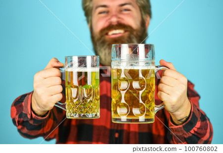 Holiday celebration. Bachelor day. Improve mood. Get drunk. Alcoholic. Thirsty man drinking beer in pub bar. Hipster drink beer. Mature bearded guy hold beer glass. Cheers toast. True sensation. Holiday celebration. Bachelor day. Improve mood. Get drunk. Alcoholic. Thirsty man drinking beer in pub bar. Hipster drink beer. Mature bearded guy hold beer glass. Cheers toast. True sensation. 100760802