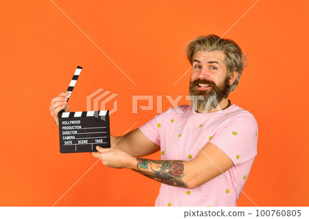 Comedy or drama. Watch movie. Film director. Actor casting. Shooting scene. Favorite series. Cinema production. Creative producer. Bearded man hold movie clapper. Film maker. Clapperboard copy space 100760805