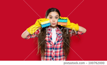 funny girl housecleaner do chores on background. photo of girl housecleaner do chores with sponge. funny girl housecleaner do chores on background. photo of girl housecleaner do chores with sponge. 100762000