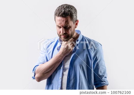 mature man with stubble wearing casual shirt. mature man with stubble isolated on grey mature man with stubble wearing casual shirt. mature man with stubble isolated on grey 100762100