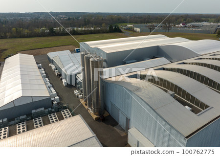 Aerial view of modern factory structure for production and distribution of industrial equipment. Concept of global industry 100762775