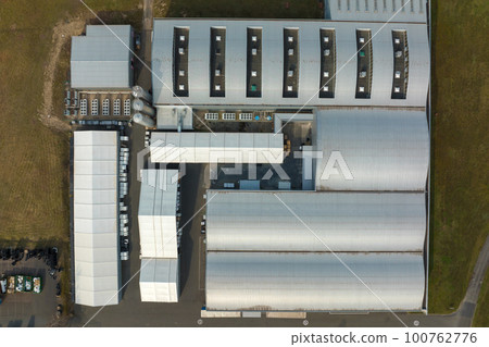 Aerial view of modern factory structure for production and distribution of industrial equipment. Concept of global industry 100762776
