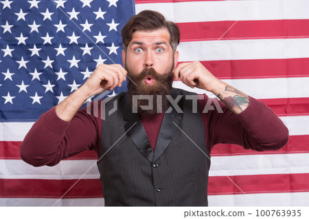 Celebration of freedom. American man celebrate. History is as long as my mustache. Promoting american values. Confident businessman american flag background. Independence day. Cultural identity Celebration of freedom. American man celebrate. History is as long as my mustache. Promoting american values. Confident businessman american flag background. Independence day. Cultural identity 100763935