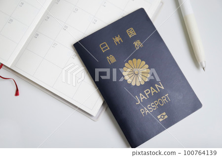 Pasiport and notebook Business trip image Pasiport and notebook Business trip image 100764139
