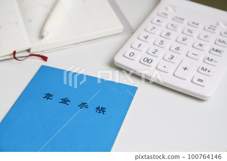 Pension notebook and computer image of old age 100764146