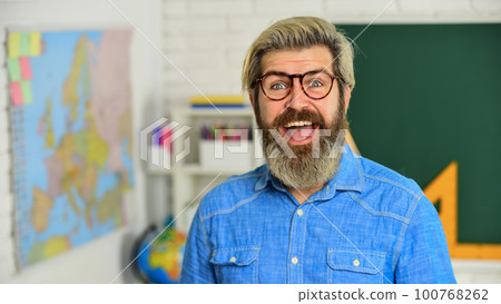 modern education concept. develop logic and creativity. start the brain engine. physics research. math teacher at board. education. exact sciences. happy bearded teacher in glasses. back to school 100768262