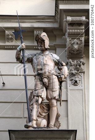 Statue of Austrian soldiers on the portal of City Hall. Graz is the capital city of Styria, Austria 100770442