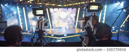 cameraman filming a concert for tv 100770938