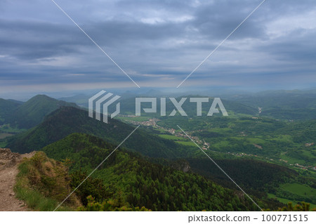 View from Maly Rozsutec to mountain village, Mala Fatra, Slovakia in spring cloudy morning 100771515