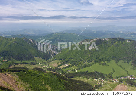 Vratna valley , Boboty, Stefanova, view from Poludnovy grun, national park Mala Fatra, Slovakia, spring day. Vratna valley , Boboty, Stefanova, view from Poludnovy grun, national park Mala Fatra, Slovakia, spring day. 100771572