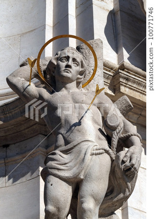 Statue of Saint Sebastian, detail of Holy Trinity plague column in front of Matthias Church in Budapest, Hungary Statue of Saint Sebastian, detail of Holy Trinity plague column in front of Matthias Church in Budapest, Hungary 100771746