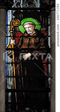 Saint, stained glass window in Saint Severin church in Paris, France Saint, stained glass window in Saint Severin church in Paris, France 100771764