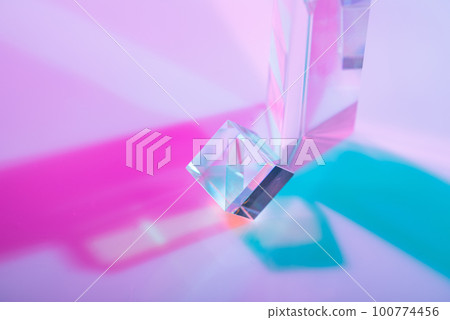 Glass crystal prism. Multicolor light effect 100774456
