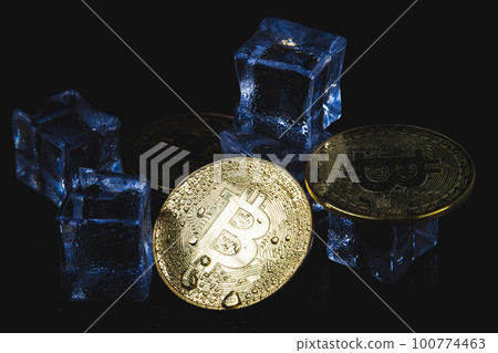 Ice and bitcoin coin. Freezing of cryptocurrency accounts. Frozen bitcoin coin. Ice and bitcoin coin. Freezing of cryptocurrency accounts. Frozen bitcoin coin. 100774463