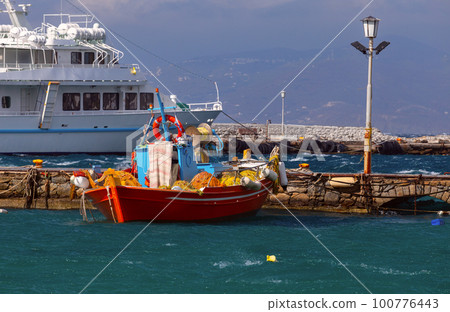 Fishing boats in the village harbor on the island of Mykonos. Fishing boats in the village harbor on the island of Mykonos. 100776443