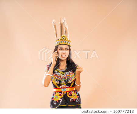 angry asian woman in king bibinge clenched her hand 100777218