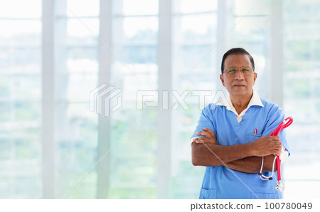 Doctor or nurse with stethoscope and face mask. 100780049