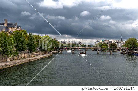 River Seine With Tourist Boat and Bridge Pont Neuf In Front Of Cathedral Notre Dame On Ile De La Cite In Paris, France 100781114