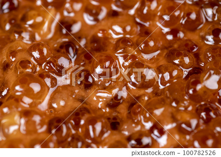 Natural red salmon caviar in large quantities 100782526