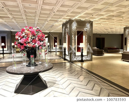 City hotel lobby and flower arrangement City hotel lobby and flower arrangement 100783593