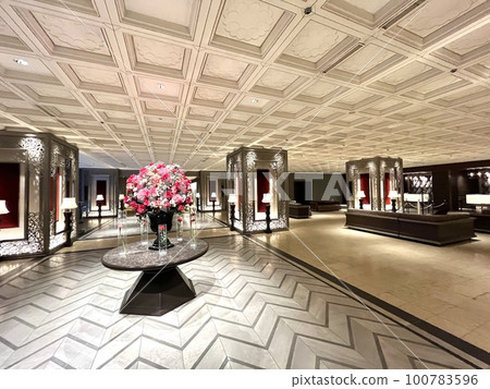 City hotel lobby and flower arrangement City hotel lobby and flower arrangement 100783596