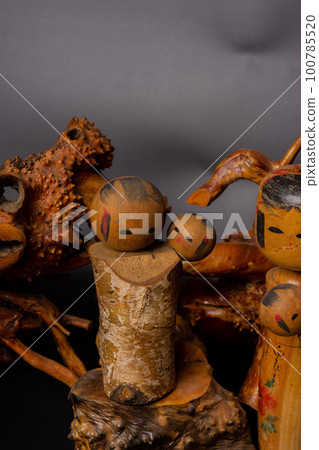 Japanese traditional kokeshi dolls and copy space 100785520