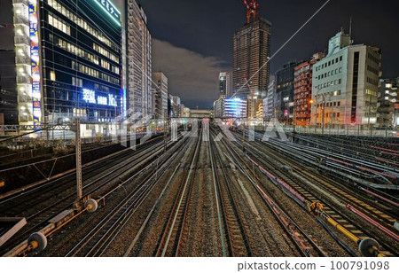 The area around the terminal station at night and the tracks 100791098