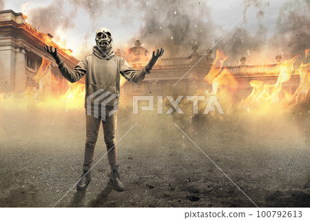 Man wearing a mask standing Man wearing a mask standing 100792613
