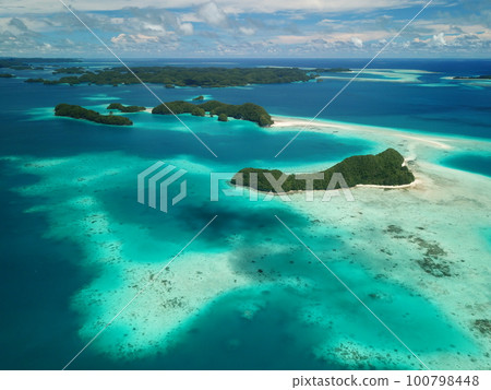 Pristine blue ocean, rock islands in Palau 100798448