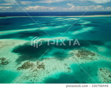 Pristine blue ocean, rock islands in Palau 100798449