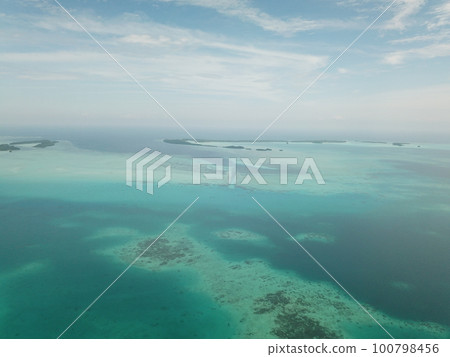 Pristine blue ocean, rock islands in Palau Pristine blue ocean, rock islands in Palau 100798456