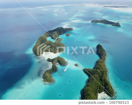 Pristine blue ocean, rock islands in Palau Pristine blue ocean, rock islands in Palau 100798523