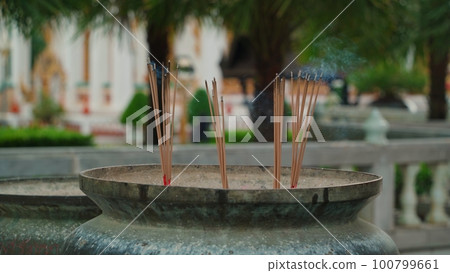 Close up of Asian Buddhist Incense Sticks 100799661