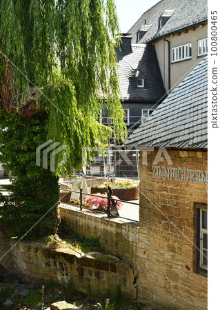 Old mill next to a weeping willow in the historic old town of Goslar in Germany Old mill next to a weeping willow in the historic old town of Goslar in Germany 100800465