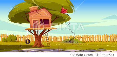 Tree house on backyard lawn with fence background 100800683