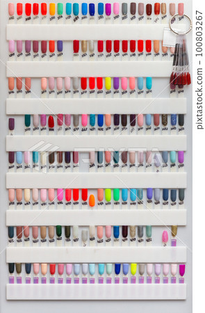 Nail polish samples of different bright colors on Nail polish samples of different bright colors on 100803267