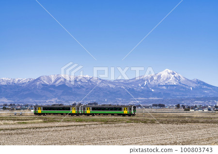 Mt. Aizu Bandai in early spring and the train on the Tadami Line, Aizumisato Town, Fukushima Prefecture Mt. Aizu Bandai in early spring and the train on the Tadami Line, Aizumisato Town, Fukushima Prefecture 100803743