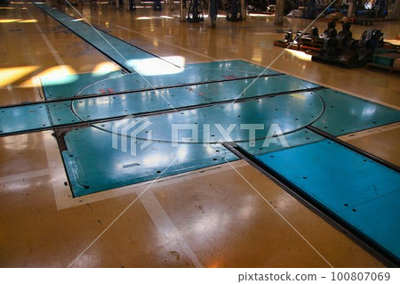 Maintenance of train bogies… Turntables at a railway car maintenance factory 100807069