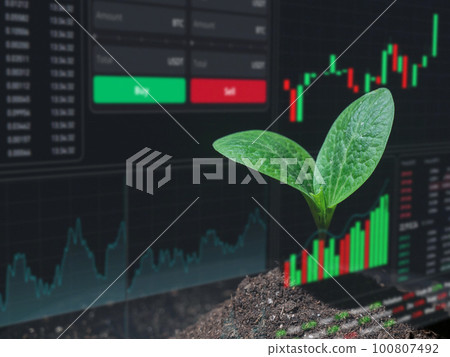 HUD menu on top of zucchini sprout on a black background. Stock charts. brokerage terminal. 100807492
