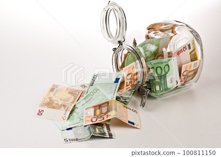 A Money jar full of savings A Money jar full of savings 100811150