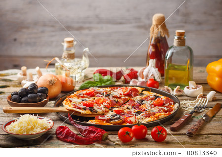 Delicious fresh pizza 100813340