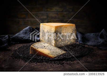 Slice segment of a cheese Slice segment of a cheese 100813926