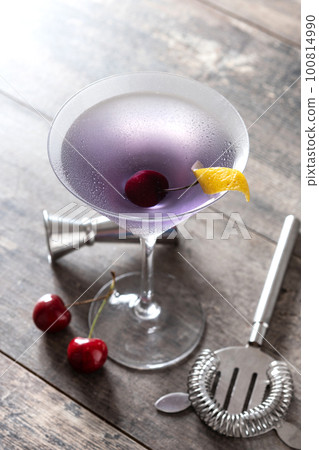 Classic aviation cocktail on wooden table. Classic aviation cocktail on wooden table. 100814990