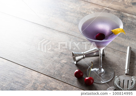 Classic aviation cocktail on wooden table. Copy space 100814995
