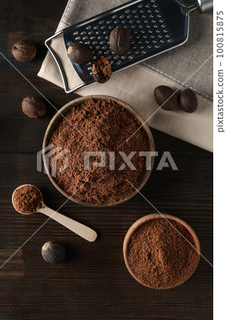 Concept of spices and condiments, nutmegs, top view Concept of spices and condiments, nutmegs, top view 100815875