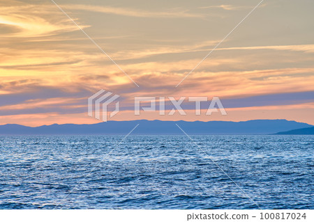 Sunset on Lake Baikal in the Barguzin Bay. Republic of Buryatia, Maksimikha settlement. 100817024