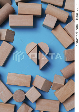 wooden building blocks forming a heart 100817208