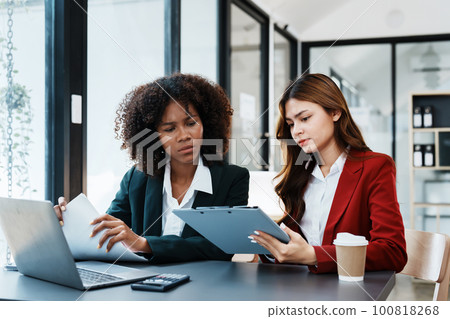 Multiethnic business, Beautiful American African with asian businesswomans people in meeting. Accountant people do document, tax, exchange, accounting and Financial advisor. Multiethnic business, Beautiful American African with asian businesswomans people in meeting. Accountant people do document, tax, exchange, accounting and Financial advisor. 100818268